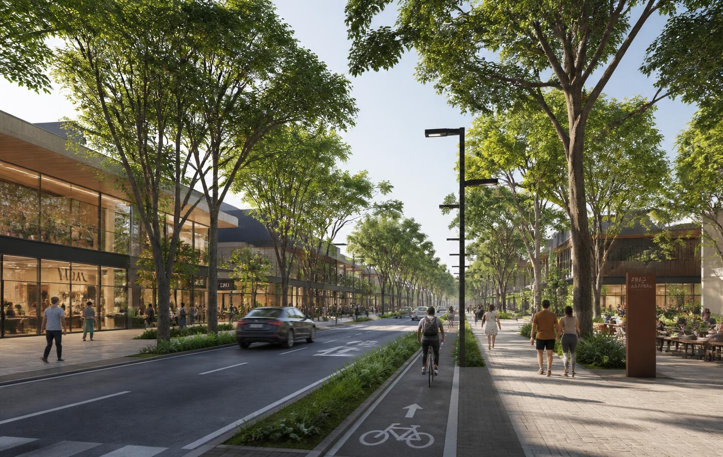 Avenida arborizada do bairro planejado do Parque Una
